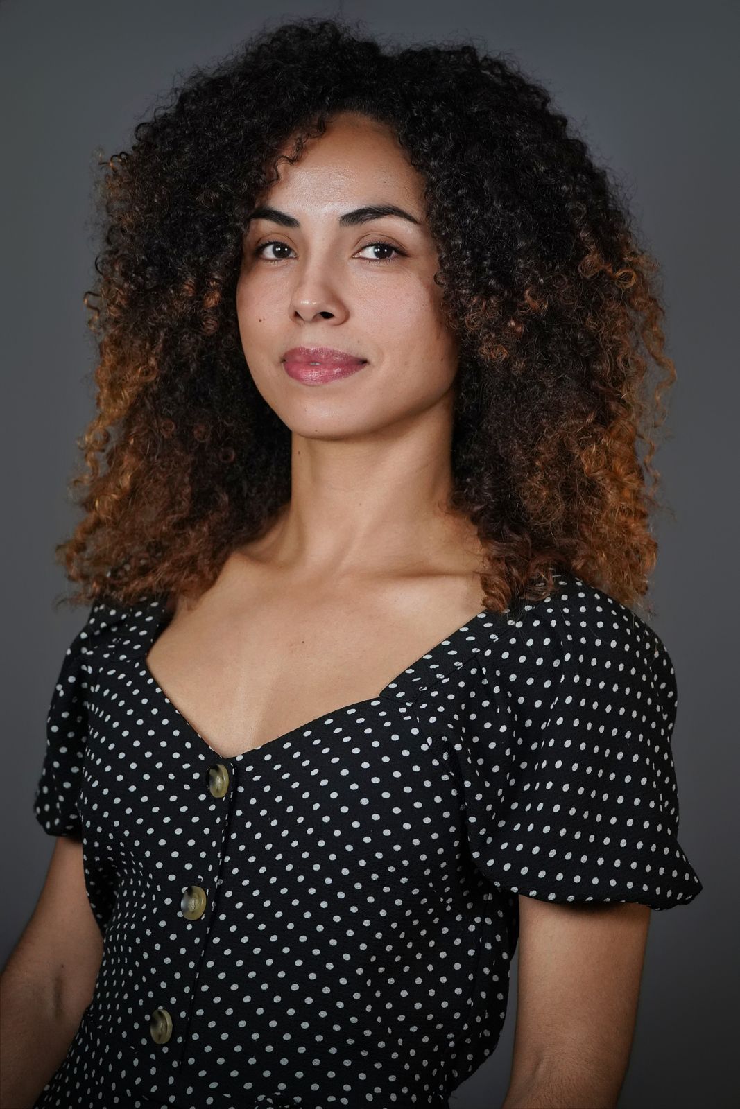 Current smiling casting portrait of Marcia Do Vales